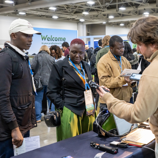 group of people at a trade show
