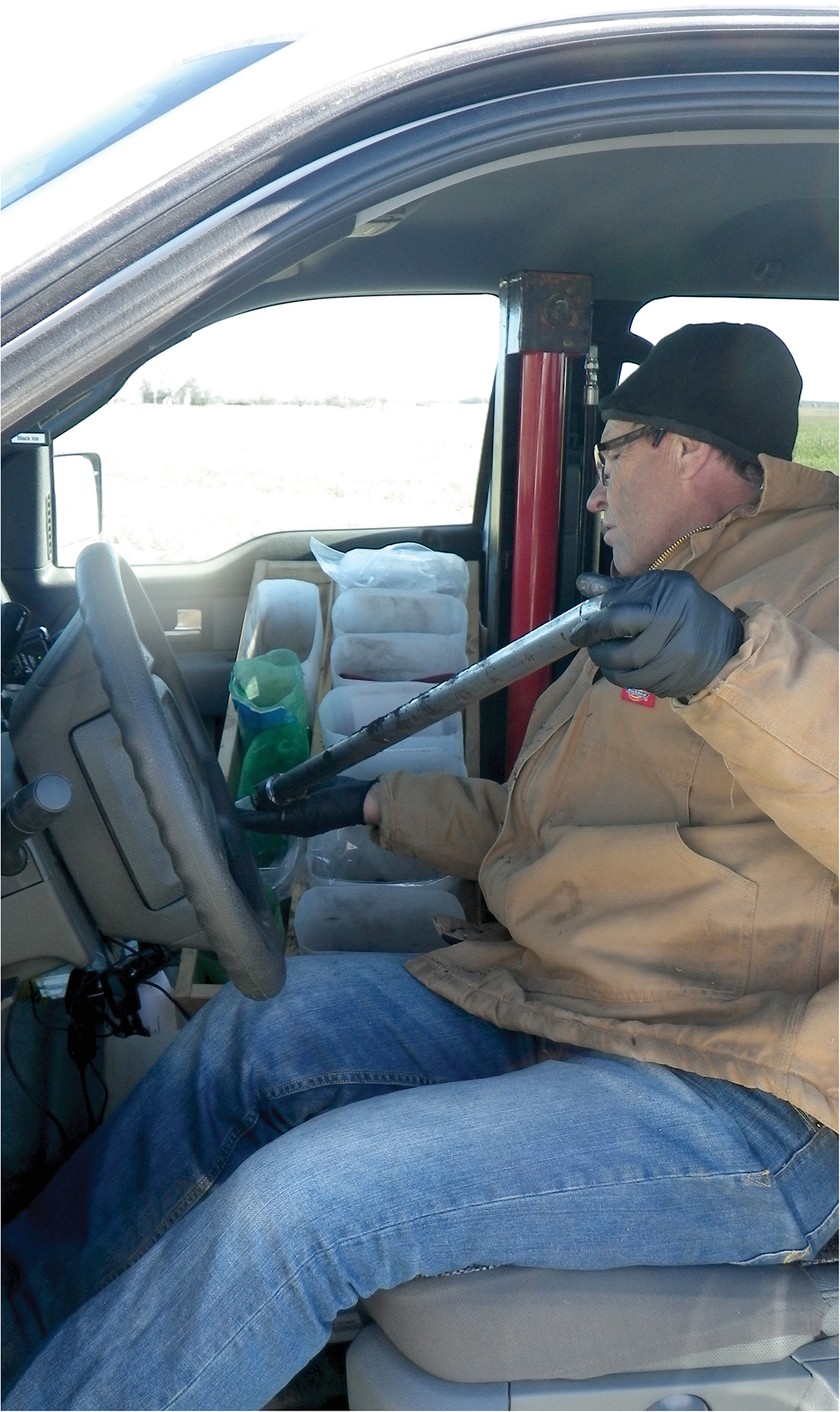 Figure 1, Hydraulic probe in truck cab to sample soil to 24 inches.