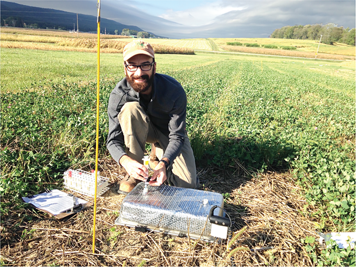 Lead author Andrew Morris measuring nitrous oxide emissions. Photo by Brosi Bradley.