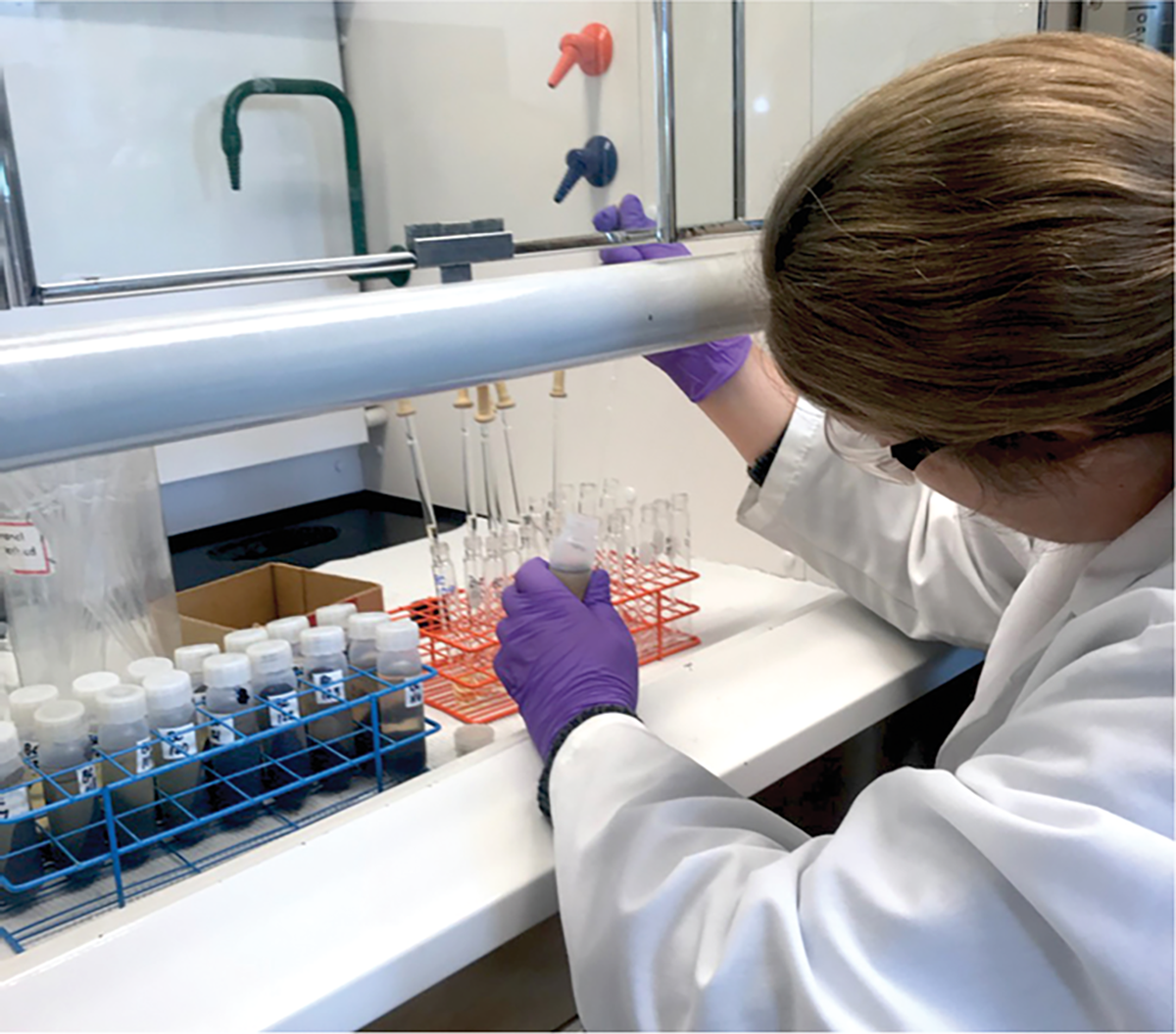 Lead author Jennifer Cooper extracting fatty acids for methyl esters for microbial fingerprinting. Photo by Ryley Thomas.