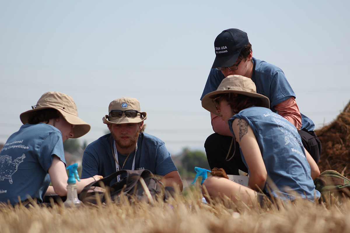 At the Fifth International Soil Judging Contest, Team USA members compete in the group judging contest event. From left: Zie Goodman, Holden Mrizek, Sinclair Anderson (front), Cole Chapman (back). Photos courtesy of Paul Tietz/Team USA Soil Judging.