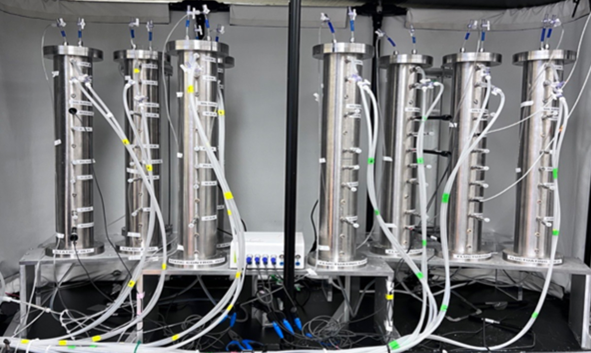 Experimental setup: The stainless-steel soil column setup equipped with moisture, temperature, and redox sensors, along with water and gas samplers. Photo courtesy of Fereidoun Rezanezhad. 