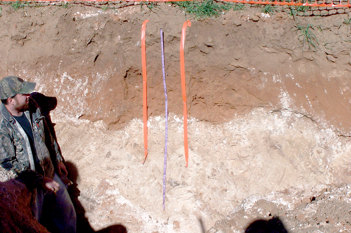Aaron Daigh, now SSSA president, in a soil pit in 2005.