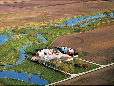 A spring view of constructed wetlands along the Embarras River in southern Champaign County, IL. Wetlands like these can help clean up tile drainage or field runoff water. Photo courtesy of the University of Illinois and originally submitted as part of a research article by Groh et al. published here: https://doi.org/10.2134/jeq2014.10.0415.
